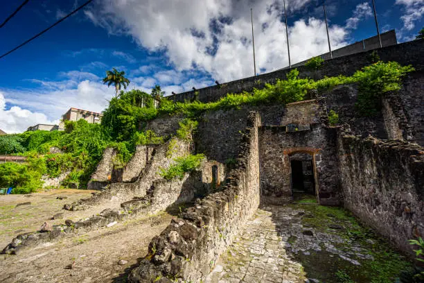 Photo of View of the the entrance to where Salle de la Comédie, Theater room, used to be. Almost 30 000 people died when, in 1902, Mount Pelée volcano erupted.