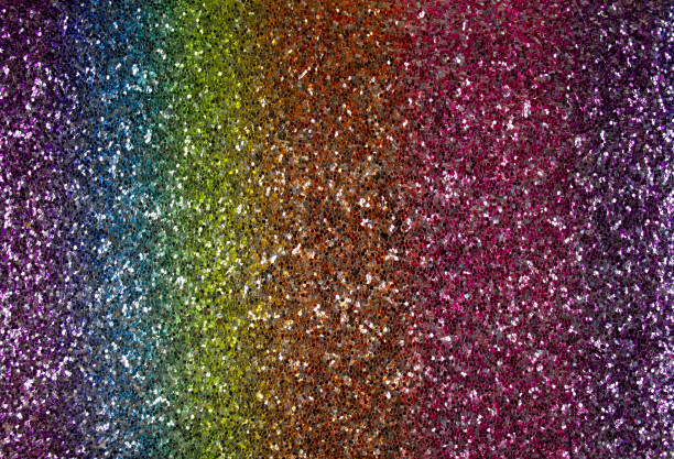 istock Texture of rainbow sparkles, close up, bright colorful textured surface 1302679462
