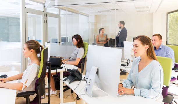 istock Coworkers working together in office 1302680258