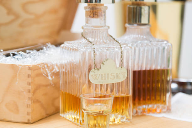 liquor, nuts and wine, food and drink winter concepts - whisky liqueur glass alcohol bottle imagens e fotografias de stock