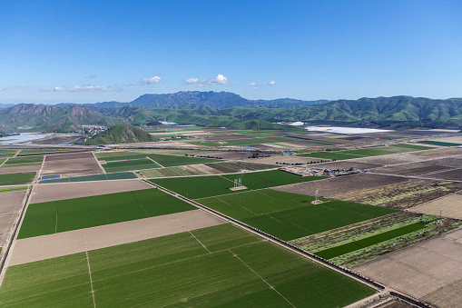 Aerial view of fertile farm fields and the Santa Monica Mountains near Camarillo in Southern California.