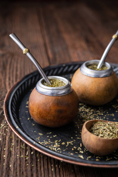 istock Healthy infused drink, classic Yerba Mate tea in a gourd with mobilla 1302684734