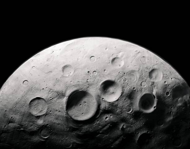 istock surface of the moon with craters, planetary satellite. 1302685727