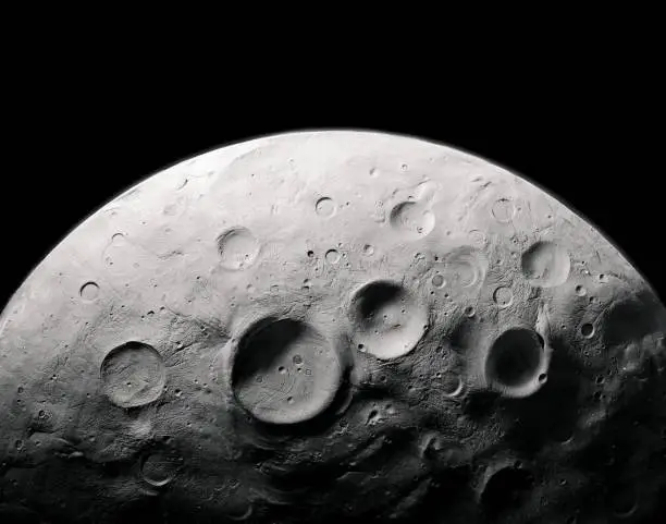 Photo of surface of the moon with craters, planetary satellite.