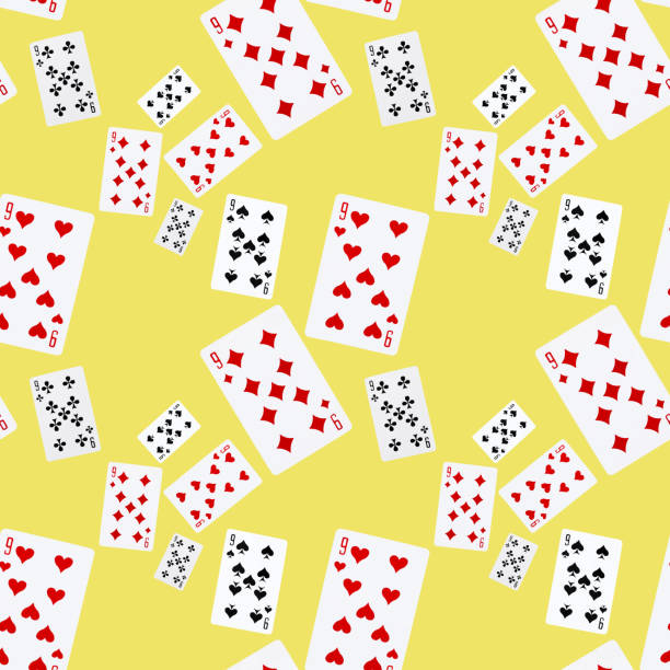 istock playing cards in bright yellow. A seamless pattern. Color 2021. Map nine. Background. 1302686816