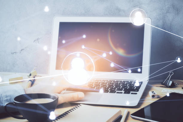 istock Media network theme hologram with man working on computer on background. Concept of internet communication. Double exposure. 1302687150