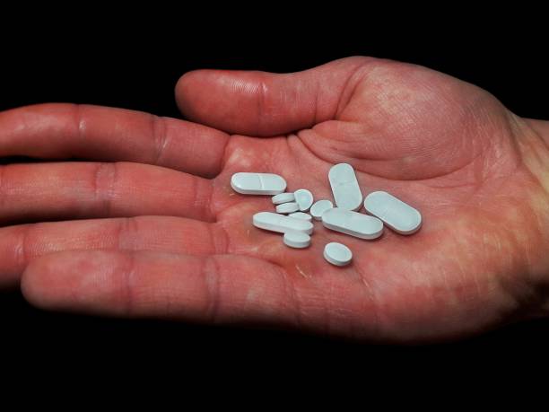 istock Antidepressants drug pills on man palm 1302688107