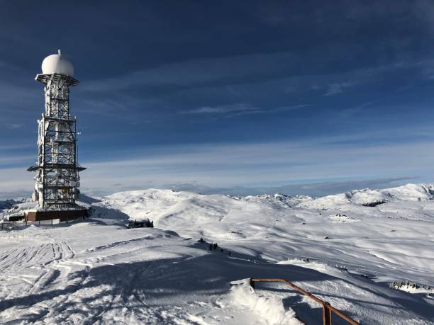 istock radio tower in the snow on the summit 1302689630