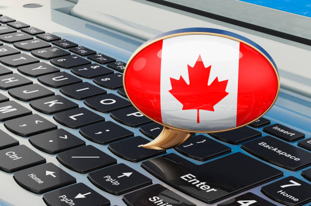 istock Speech balloon with Canadian flag on keyboard laptop, 3D rendering isolated on white background 1302690349
