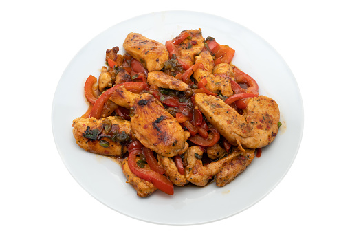Chicken stir fry with red bell peppers, cabbage and onion - white background