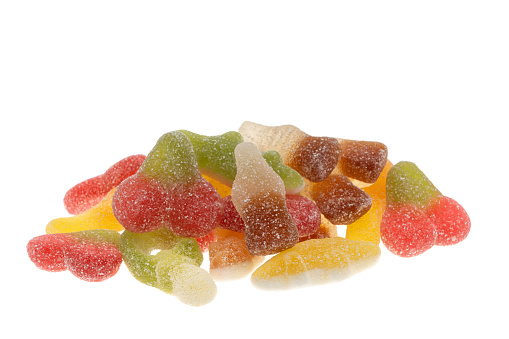 Heap of fizzy sour candies - white background