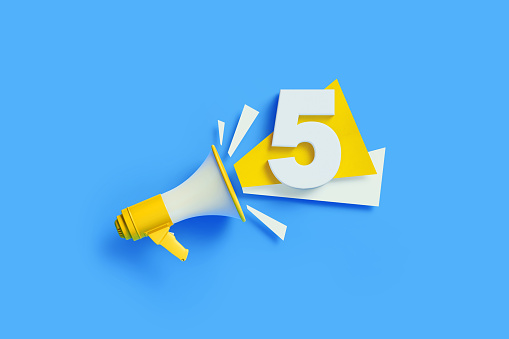 Number five coming out from a yellow megaphone on blue background. Horizontal composition with copy space. Great use for count down concepts.
