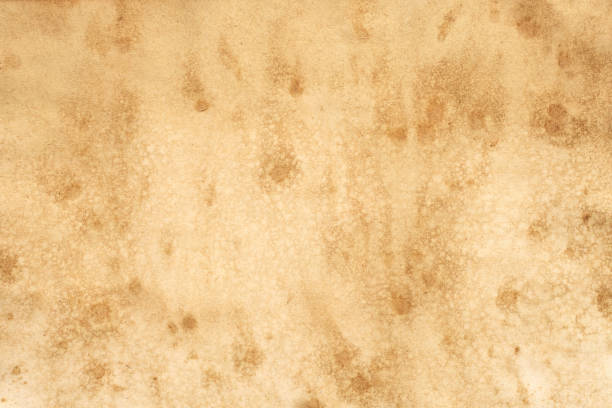 istock Old brown paper grunge background. Abstract liquid coffee color. 1302693469