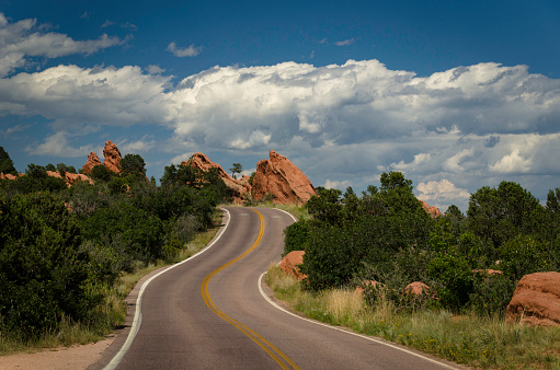 Roadway through scenic park of rock formations in Colorado