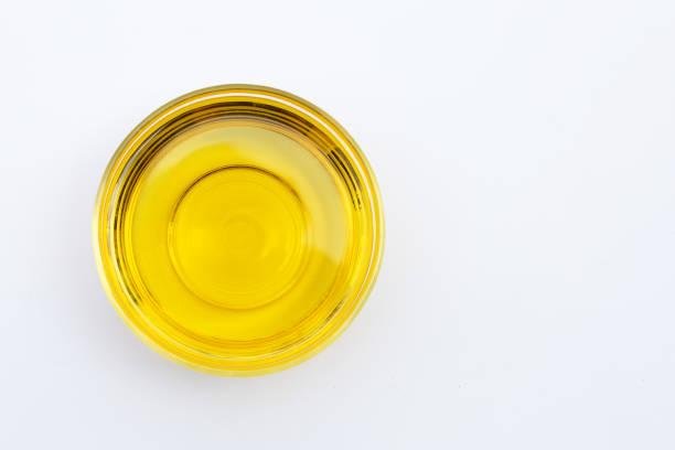 istock Rice bran oil on white background. 1302695447