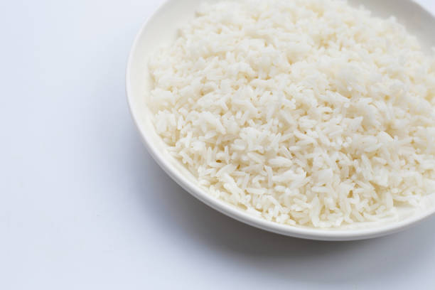 istock Dish of rice on white background. 1302695467