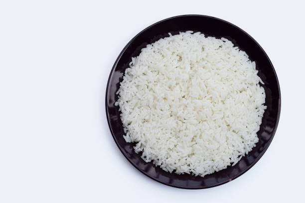 istock Dish of rice on white background. 1302695498