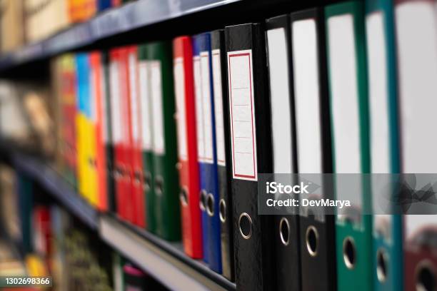 Paper Binder Shelf In A Shop Binder Sale Multicolor Stationery Folders Stock Photo - Download Image Now