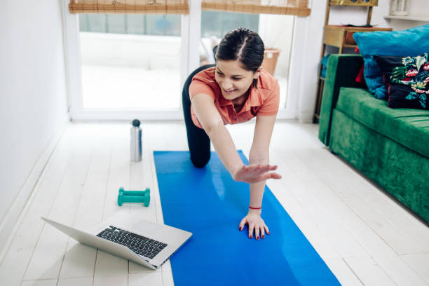 istock Beautiful young woman doing an online training 1302702436