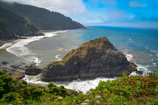 Huge rocks and cliffs of the Oregon pacific coastline.