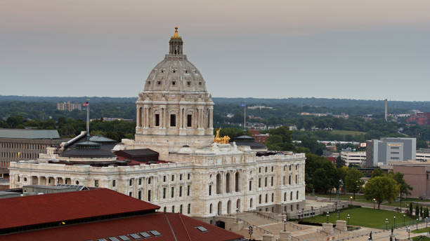 istock Flags Flying Over Minnesota State Capitol - Drone Shot 1302708064