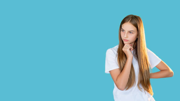 istock confused teenager problem solution uncertain girl 1302708180