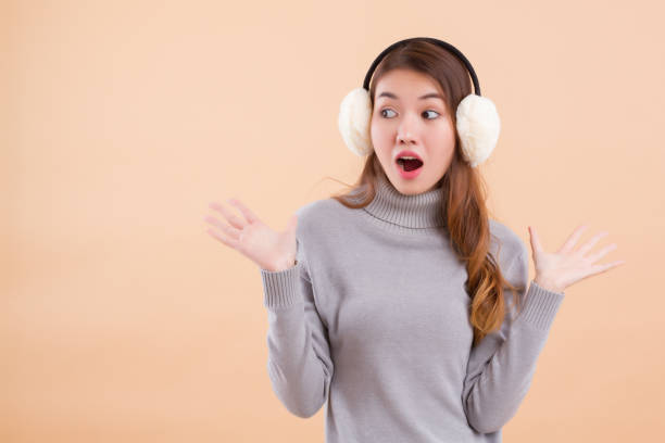 istock excited surprised asian woman looking up 1302708521