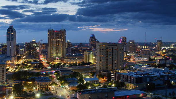 istock Downtown San Antonio at Nightfall - Aerial 1302711323