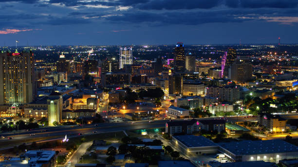 istock Interstate Crossing Downtown San Antonio at Night - Aerial 1302711331