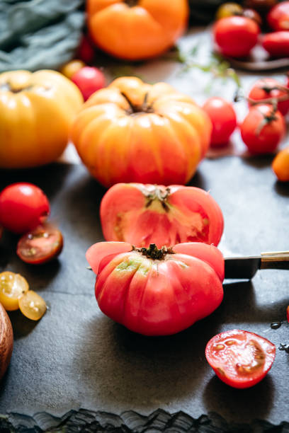 istock Flat lay with heirloom tomatoes and cherry tomatoes 1302711340