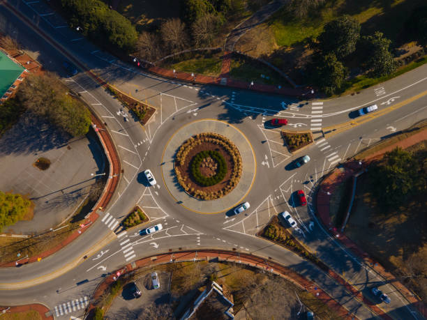 Roundabout Intersection Aerial View Roundabout Intersection car city urban scene commuter stock pictures, royalty-free photos & images