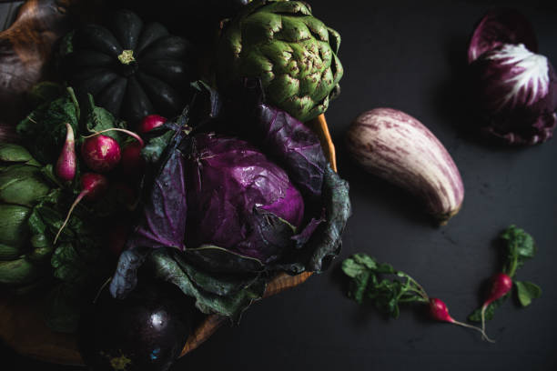 istock Still life of vegetables with dark background 1302715507