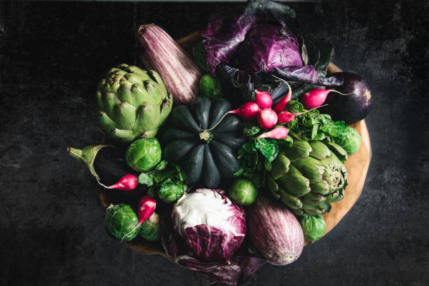 istock Still life of vegetables with dark background 1302715518