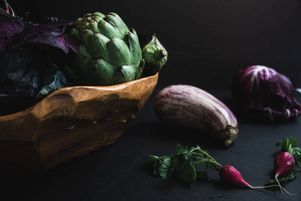 istock Still life of vegetables with dark background 1302715790