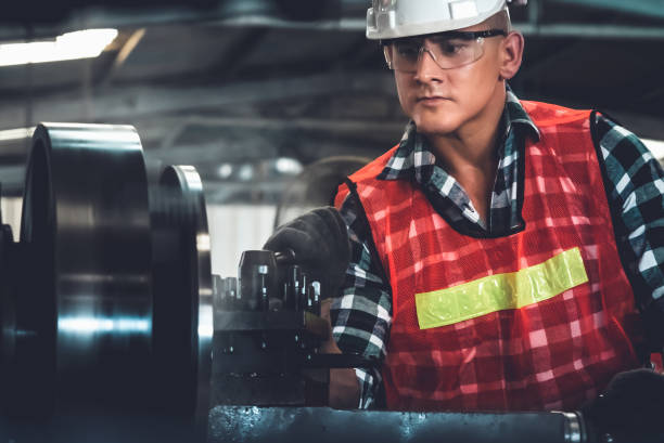 istock Smart factory worker or engineer do machine job in a manufacturing workshop 1302717908