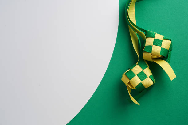 istock ribbon ketupat on green and white  background 1302725725