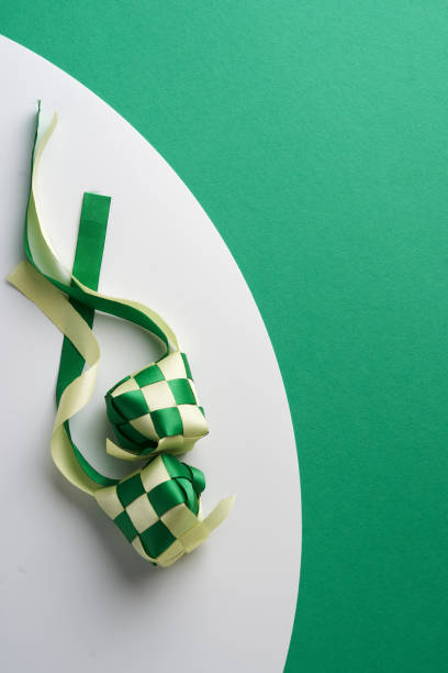 istock ribbon ketupat on green and white  background 1302725766
