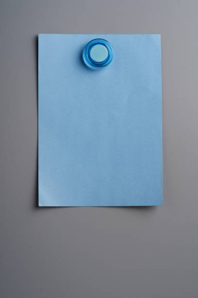 istock Magnetic board and blue color blank notes 1302725779