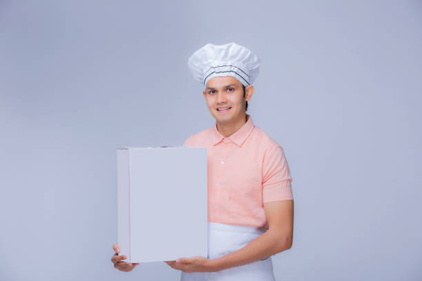 istock Smiling female chef stock photo 1302730450