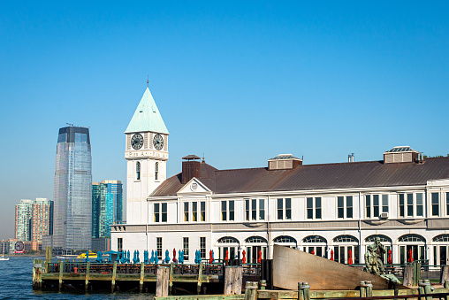 New York City, NY, USA - September 18, 2015: Brooklyn, Pier A in the early morning. The Harbor House (commonly referred to as City Pier A) is a municipal pier in the Hudson River at Battery Park in Lower Manhattan, New York City. It is sometimes nicknamed the \