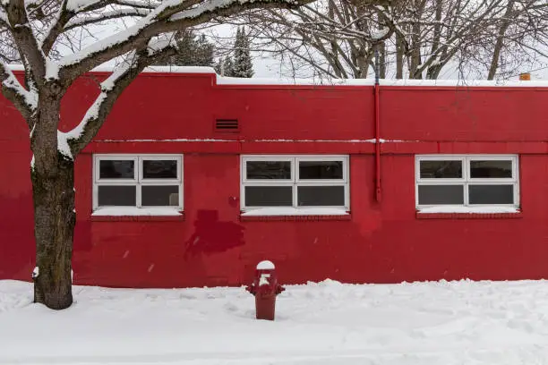 Photo of Red Brick Building In The Snow