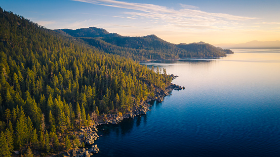 Aerial View of Lake Tahoe Shoreline with Mountains and Turquoise Blue Waters