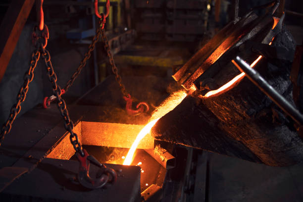 istock Filling cast with molten iron in foundry. Metallurgy and industry. 1302745033