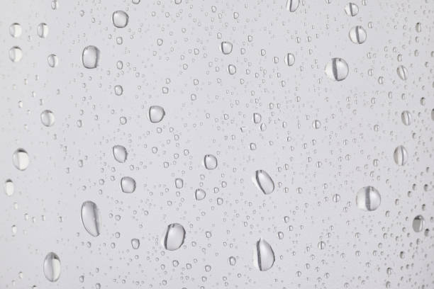 istock Condensation on glass . Ice Cold Drinking glass With Water Drops Condensation 1302747180