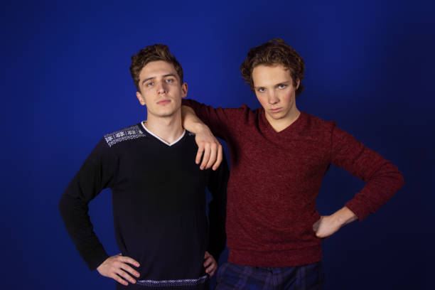 istock Two young attractive guys. Friendship and relationships. 1302747890