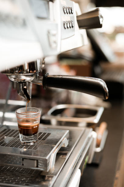 istock Glass of coffee on the table 1302749338