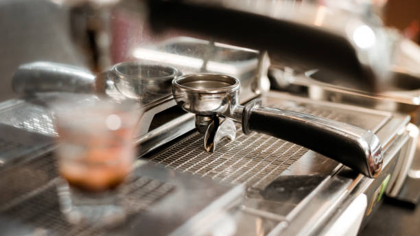 istock Glass of coffee on the table 1302749480