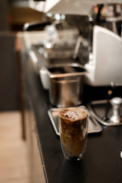 istock Glass of coffee on the table 1302749964