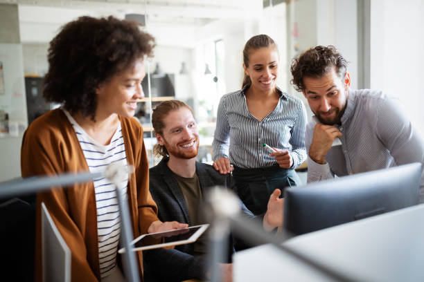 istock Collaboration and analysis by business people working in office 1302753975