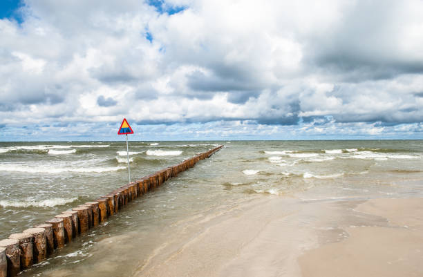 istock Cloudy beach sea landscape, Leba, Baltic Sea, Poland 1302757047